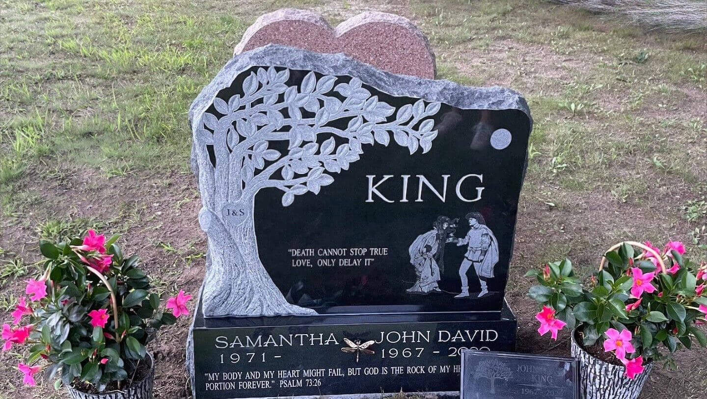 Close up of a custom granite headstone